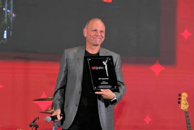 AlphaGraphics of Buckhead Founder, Louis Malooley, accepting the Franny Award.